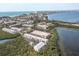 Coastal living is easy from this complex nestled between a pond and Sarasota Bay at 3601 East Bay Dr # 205, Holmes Beach, FL 34217