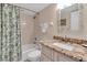 Full bathroom with granite countertop vanity and shower-tub combo at 3601 East Bay Dr # 205, Holmes Beach, FL 34217
