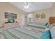 Charming guest room featuring two beds and a light color palette at 3601 East Bay Dr # 205, Holmes Beach, FL 34217