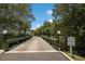 Private wooden bridge leading into the secluded The Cove at Sandy Pointe community at 3601 East Bay Dr # 205, Holmes Beach, FL 34217