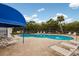 Inviting community swimming pool is the central place for fun and relaxation at 3601 East Bay Dr # 205, Holmes Beach, FL 34217