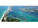 Scenic aerial view of the coastline, turquoise waters, and inter-coastal waterways of Anna Maria Island at 3780 Pinebrook Cir # 102, Bradenton, FL 34209