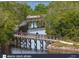 Wooden boardwalk through a lush, green environment, ideal for cycling and enjoying nature at 3780 Pinebrook Cir # 102, Bradenton, FL 34209