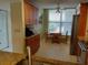 Kitchen features granite countertops, stainless appliances, and a breakfast nook with a view to the outdoors at 3780 Pinebrook Cir # 102, Bradenton, FL 34209