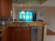 Granite countertops and stainless steel appliances add a touch of elegance to the kitchen at 3780 Pinebrook Cir # 102, Bradenton, FL 34209
