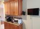 Kitchen counter with wooden cabinets and stainless steel appliances at 3780 Pinebrook Cir # 102, Bradenton, FL 34209