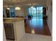 Open concept kitchen, living and dining area with sliding doors to the outside at 3780 Pinebrook Cir # 102, Bradenton, FL 34209