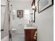 Bathroom featuring vanity, toilet, and shower with curtain at 4109 Riverview Blvd, Bradenton, FL 34209
