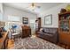 Cozy bedroom with hardwood floors, a ceiling fan, and natural light at 4109 Riverview Blvd, Bradenton, FL 34209