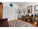 Bedroom featuring hardwood floors, a closet, and built-in bookshelves at 4109 Riverview Blvd, Bradenton, FL 34209