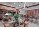 Relaxing clubhouse with bar, TV, and comfortable seating at 4178 Central Sarasota Pkwy # 325, Sarasota, FL 34238