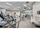 Gym with cardio machines, weightlifting equipment, and space for floor exercises at 4178 Central Sarasota Pkwy # 325, Sarasota, FL 34238