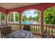 Seating area with views of the beautiful blue community pool and surrounding tropical landscape at 4178 Central Sarasota Pkwy # 325, Sarasota, FL 34238
