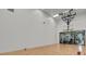 Indoor racquetball and basketball court with hardwood floor and basketball hoop at 4178 Central Sarasota Pkwy # 325, Sarasota, FL 34238