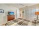 Bedroom with a ceiling fan, closet with sliding doors and comfortable bed at 4181 Brittany Ln # 25, Sarasota, FL 34233