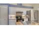 Bright kitchen features stainless steel appliances, light cabinets, and neutral countertops and backsplash at 4181 Brittany Ln # 25, Sarasota, FL 34233