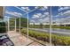 Relax on this screened lanai with lovely views of the lake and meticulously maintained landscaping at 4181 Brittany Ln # 25, Sarasota, FL 34233
