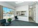 Recreation room featuring views of the pool, a snack area, and comfortable seating at 4181 Brittany Ln # 25, Sarasota, FL 34233