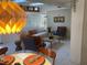 Bright living room with modern furnishings and a unique light fixture at 4408 Midnight Pass Rd, Sarasota, FL 34242
