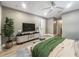 Cozy bedroom with ceiling fan, soft lighting, and neutral decor at 4850 51St W St # 4205, Bradenton, FL 34210