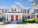 Charming townhome exterior with red shutters and well-maintained landscaping offers inviting curb appeal at 4850 51St W St # 4205, Bradenton, FL 34210