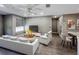 Bright living room with modern furnishings, ceiling fan, and wood-look floors at 4850 51St W St # 4205, Bradenton, FL 34210