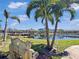 Scenic view of the community pond with gazebo and palm trees at 4850 51St W St # 4205, Bradenton, FL 34210