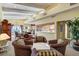 Community clubhouse with comfortable seating and kitchen area, perfect for social gatherings and events at 5055 Gulf Of Mexico Dr # 115, Longboat Key, FL 34228