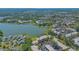 Beautiful aerial view of lakeside condos surrounded by lush greenery and mature trees at 515 Spring Lakes Blvd # 515, Bradenton, FL 34210