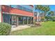 Beautiful condo backyard with a patio and lake view, perfect for outdoor relaxation and entertaining at 515 Spring Lakes Blvd # 515, Bradenton, FL 34210