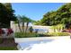 Beautiful entrance to IMG Academy in Bradenton, Florida, featuring lush landscaping and a prominent sign at 515 Spring Lakes Blvd # 515, Bradenton, FL 34210
