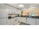 Bright kitchen featuring white cabinets, modern appliances, and an open layout, perfect for cooking and entertaining at 515 Spring Lakes Blvd # 515, Bradenton, FL 34210