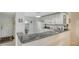 Bright kitchen features marble counters, white cabinetry, and stainless appliances at 515 Spring Lakes Blvd # 515, Bradenton, FL 34210