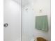 Stylish bathroom with a glass-enclosed shower, textured tile, and modern fixtures for a spa-like experience at 5247 Carmilfra Dr, Sarasota, FL 34231
