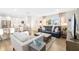 Open-concept living area featuring a modern kitchen and comfortable seating, perfect for entertaining at 5247 Carmilfra Dr, Sarasota, FL 34231