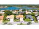 Aerial view of the home near a lake at 5270 Far Oak Cir, Sarasota, FL 34238