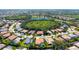 Aerial view of a community featuring single-Gathering homes with private pools and well-manicured lawns at 5270 Far Oak Cir, Sarasota, FL 34238