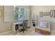 Office with natural light, desk, shelving, and a comfortable chair at 5270 Far Oak Cir, Sarasota, FL 34238