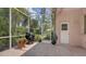 Covered patio area offers ample space for grilling and outdoor storage, perfect for alfresco dining at 5270 Far Oak Cir, Sarasota, FL 34238