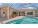 Backyard showcases a screened pool with an adjacent lounging area and seamless access from the house at 5270 Far Oak Cir, Sarasota, FL 34238