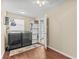 Clean laundry room with modern washer and dryer and ample storage space at 5563 America Dr, Sarasota, FL 34231