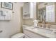 Bathroom with a marble countertop vanity and decor at 5963 Midnight Pass Rd # 355, Sarasota, FL 34242