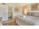 Bedroom with en-suite bathroom and coastal décor at 5963 Midnight Pass Rd # 355, Sarasota, FL 34242
