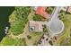 Aerial view of the property, showcasing its prime location, proximity to the water, lush landscaping, and private pool at 6222 Stillwater Ct, Bradenton, FL 34201
