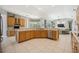 Open-concept kitchen with ample counter space and a breakfast nook nearby at 6222 Stillwater Ct, Bradenton, FL 34201