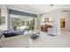 Inviting living room with large windows offering backyard views and natural light at 6222 Stillwater Ct, Bradenton, FL 34201