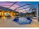 Screened-in lanai featuring a sparkling pool and a relaxing spa at 6222 Stillwater Ct, Bradenton, FL 34201