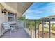 Scenic balcony with comfortable seating, perfect for enjoying water views and tranquil surroundings at 628 Estuary Dr, Bradenton, FL 34209