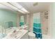 Well-maintained bathroom with a tub and shower combination and ample lighting at 628 Estuary Dr, Bradenton, FL 34209