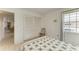 Serene bedroom featuring a comfortable bed, clean lines and ample closet space at 628 Estuary Dr, Bradenton, FL 34209